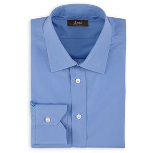 Anto blue poplin dress shirt, neatly folded, showcasing the fabric's texture and the shirt’s elegant design.