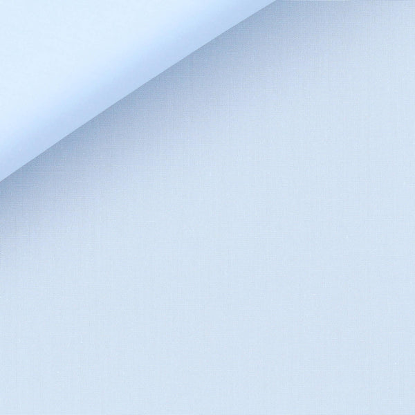 Close-up view of an Anto light blue poplin fabric swatch, highlighting its fine texture and quality.